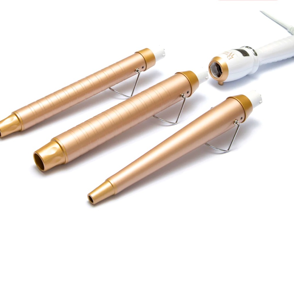 NWT. Professional Styler Trio Edition 3 interchangeable barrels. Curling iron